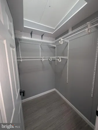 a view of a room with racks on the wall