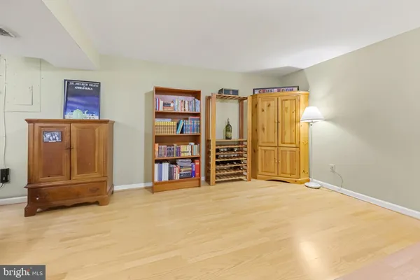 a view of a livingroom with shelves