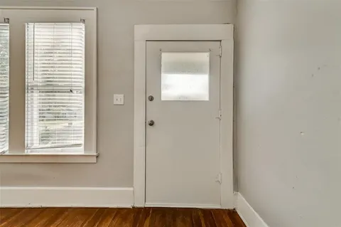 a view of a room that has a window in it