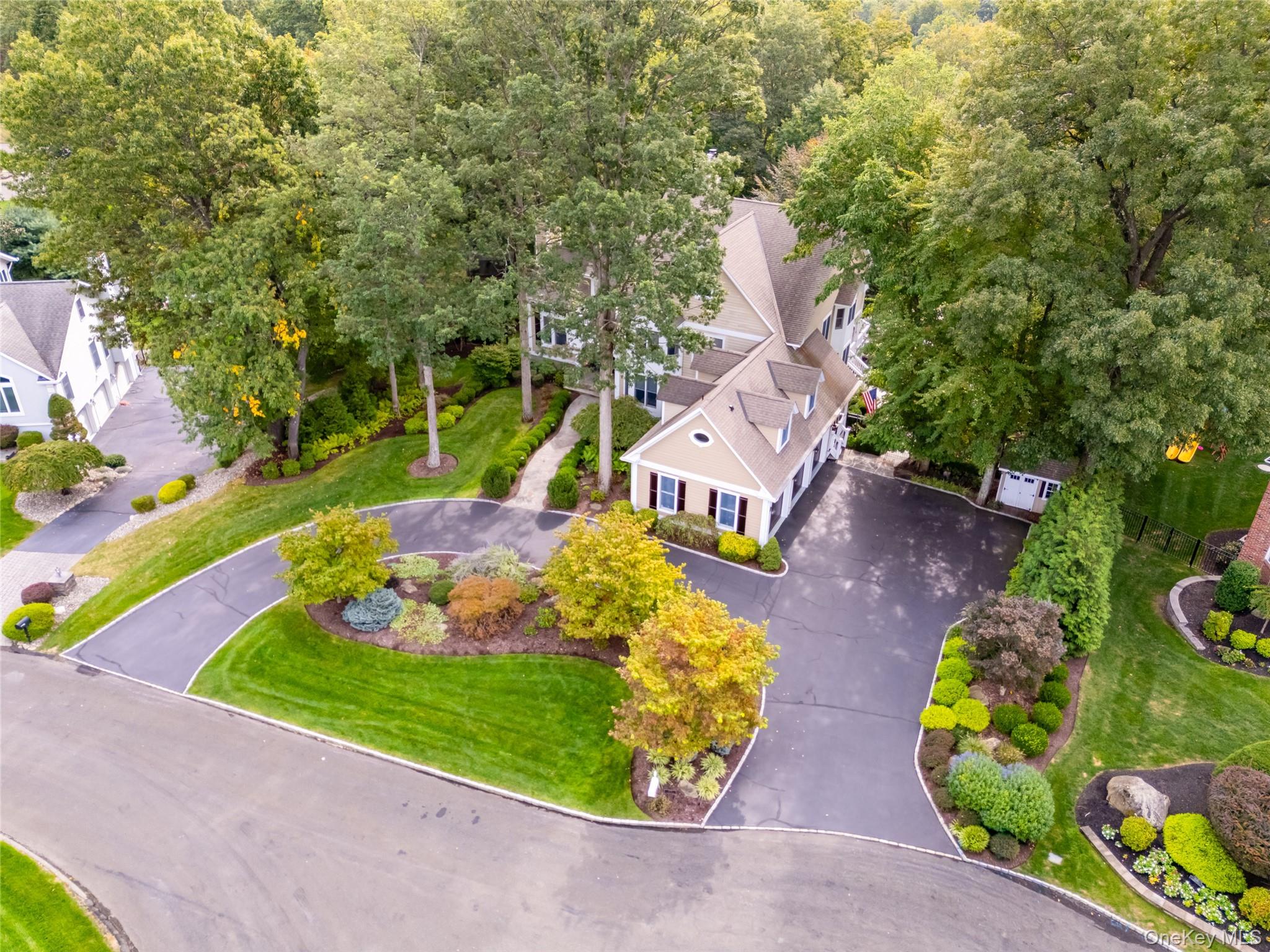 6 Gooler Court Stony Point, NY 10980 - Photo 49 of 50 an aerial view of a house with a garden and patio