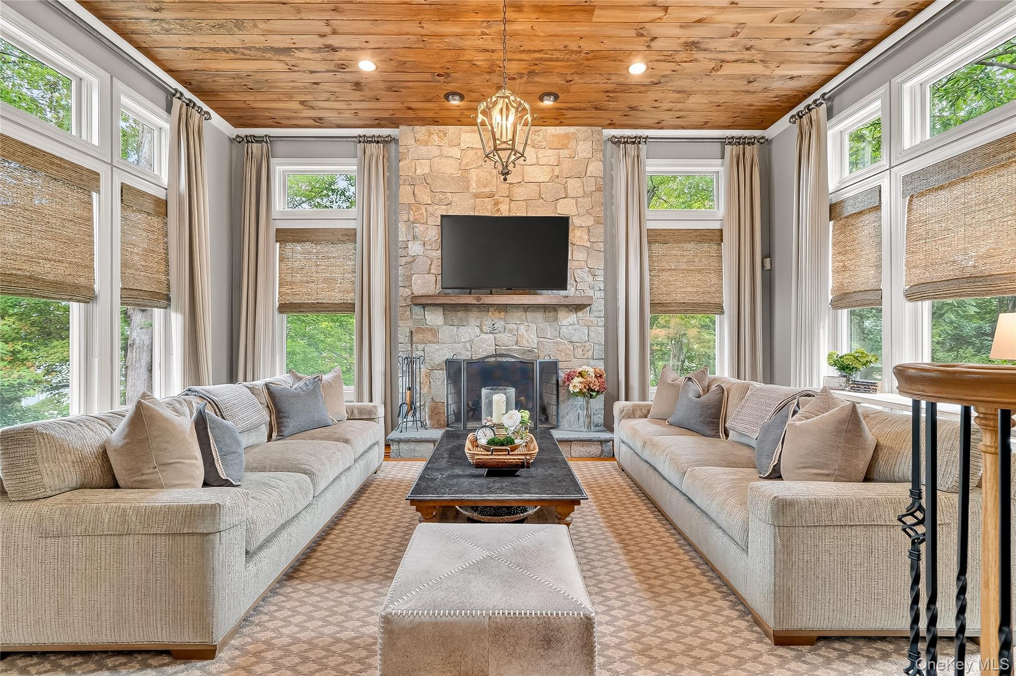 6 Gooler Court Stony Point, NY 10980 - Photo 6 of 50 a living room with furniture fireplace and large windows