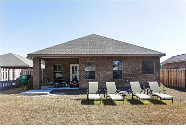 14 Riverbirch Loop Santa Rosa Beach, FL 32459 - Photo 17 of 20 a view of a house with backyard porch and sitting area