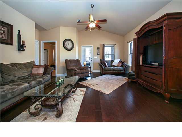 14 Riverbirch Loop Santa Rosa Beach, FL 32459 - Photo 2 of 20 a living room with furniture a flat screen tv and a window