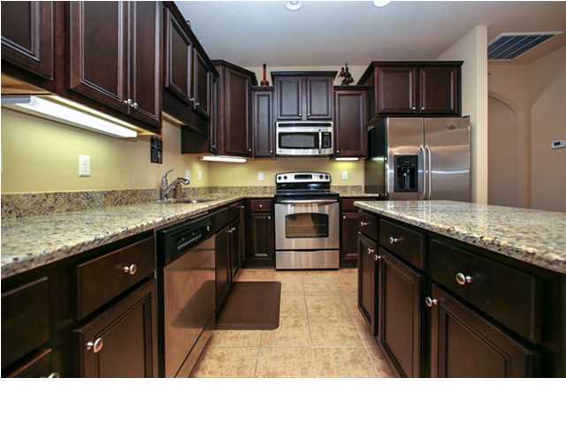 14 Riverbirch Loop Santa Rosa Beach, FL 32459 - Photo 4 of 20 a kitchen with stainless steel appliances granite countertop counter space a sink a stove and cabinets