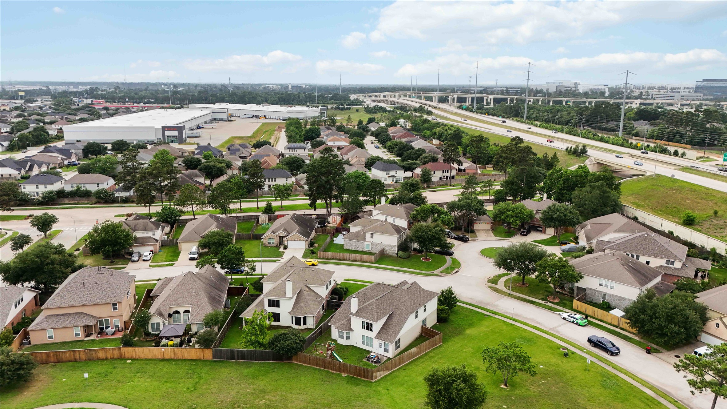 803 Northridge Terrace Lane Spring, TX 77373 - Photo 41 of 42 an aerial view of a house with a garden and lake view