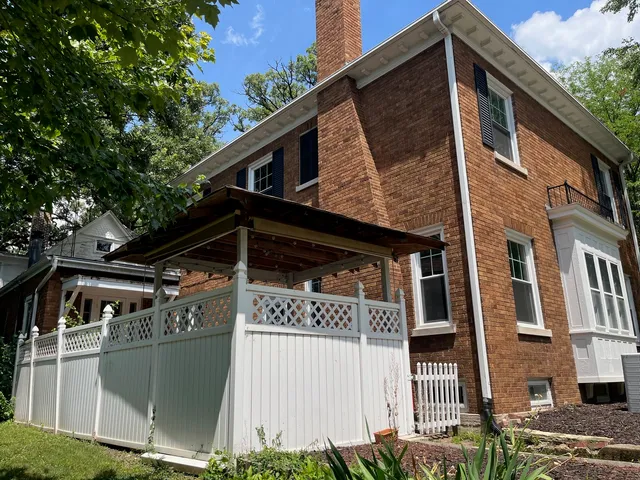 a front view of a house with garage