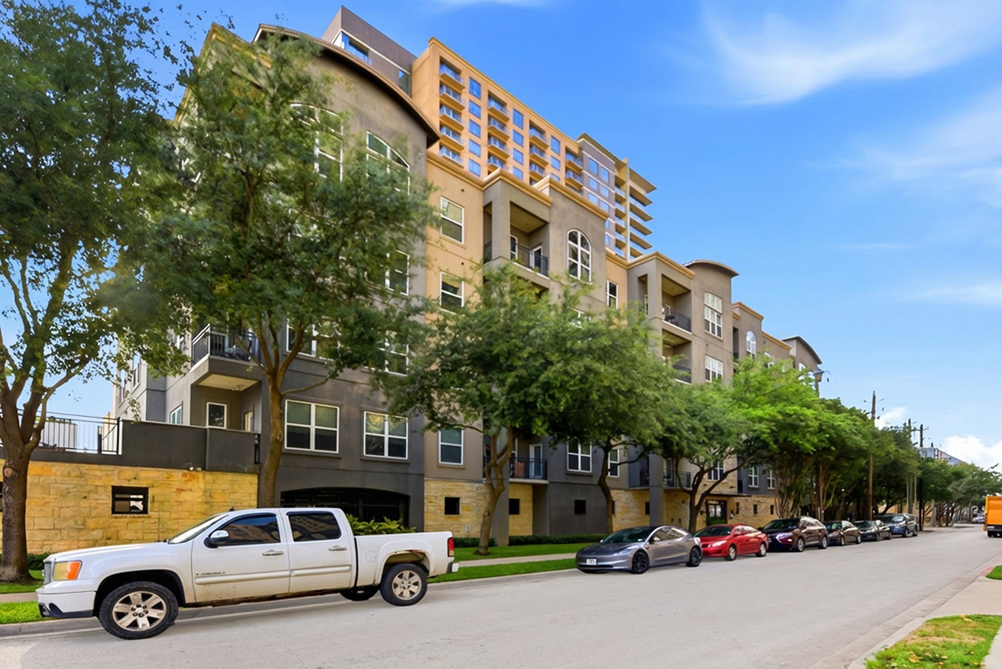 1010 Rosine Street, Unit 43 Houston, TX 77019 - Photo 44 of 48 a car parked in front of a building