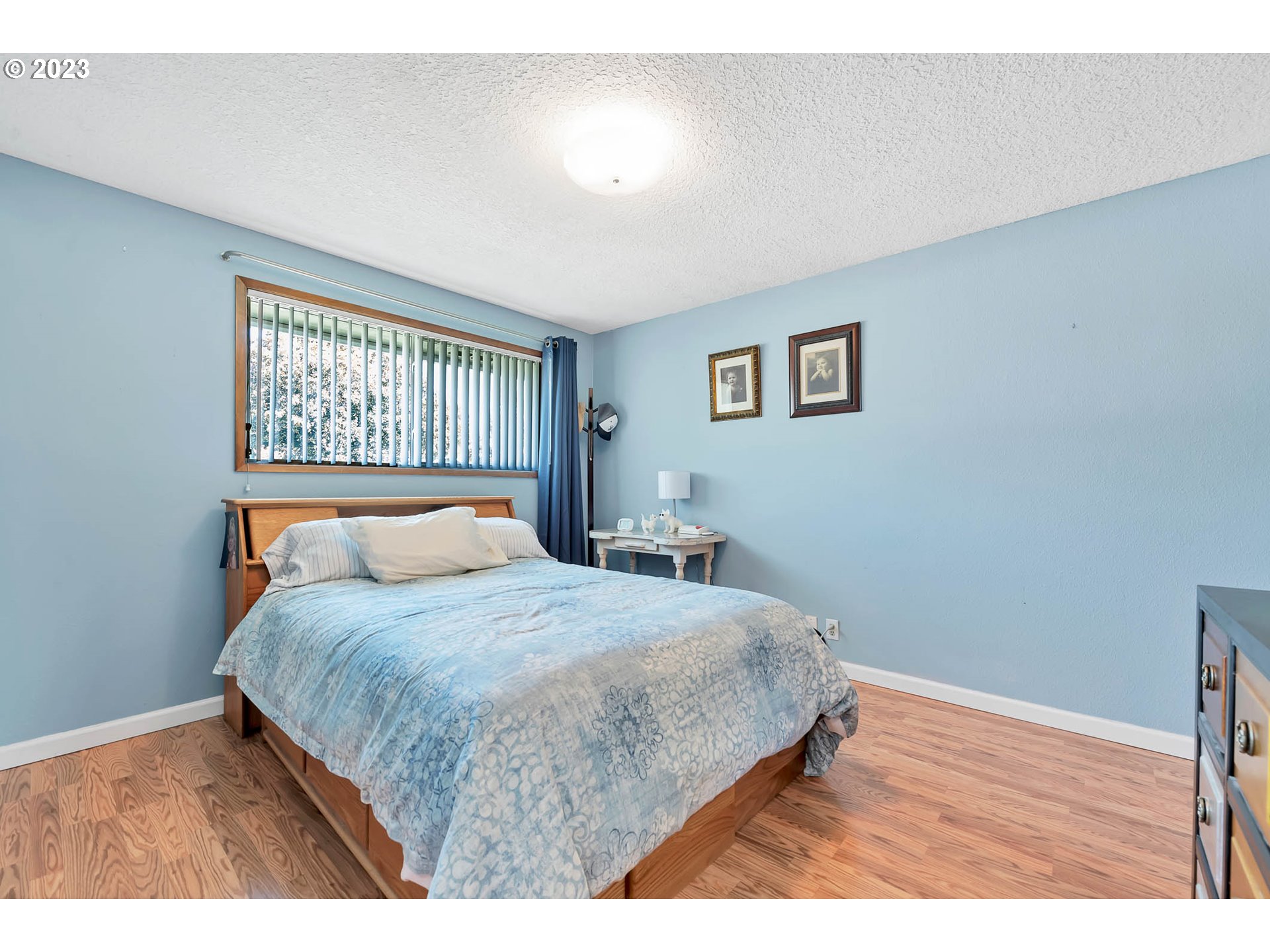 576 67th Street Springfield, OR 97478 - Photo 19 of 32 a bedroom with a bed and a window