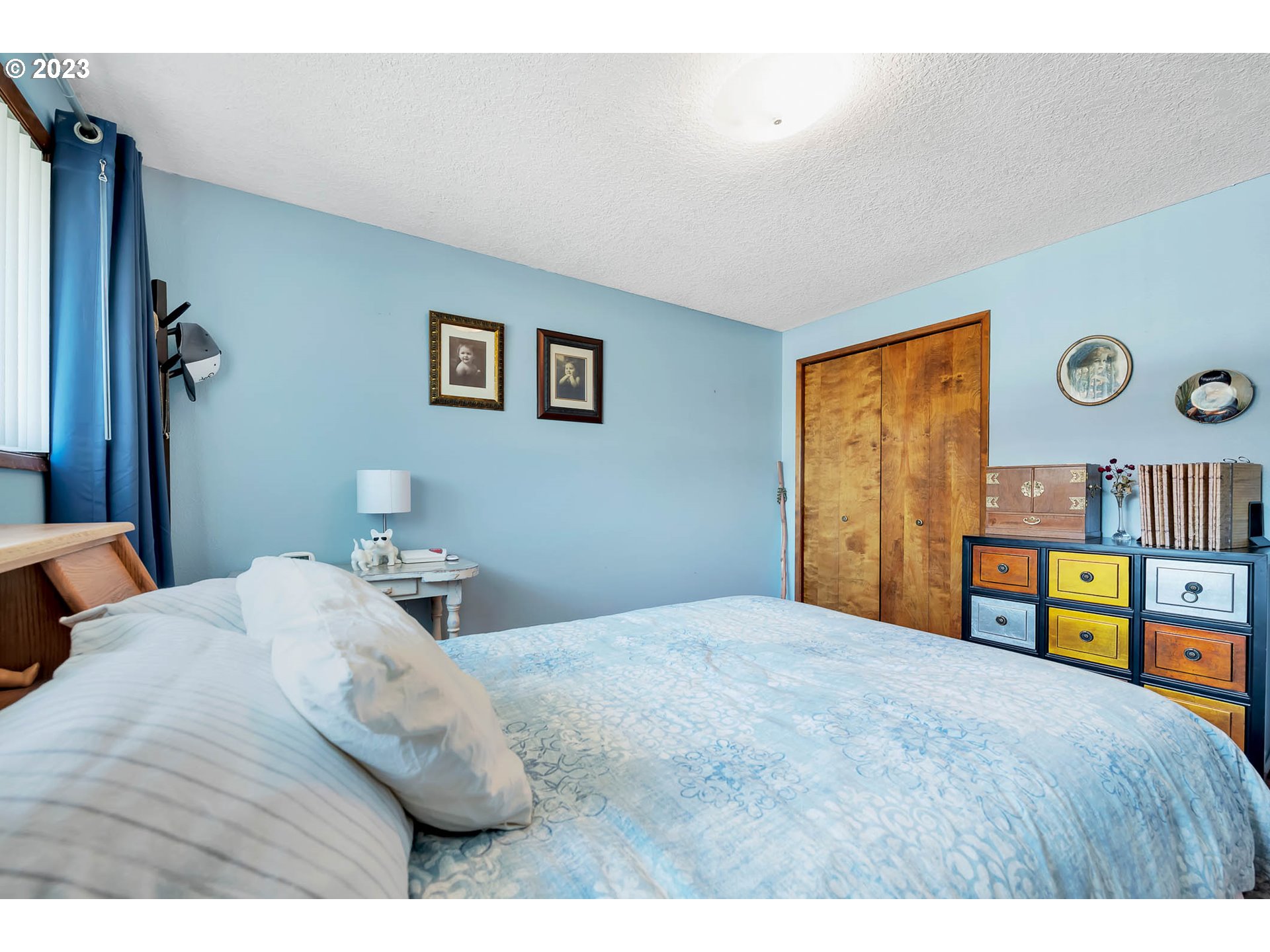 576 67th Street Springfield, OR 97478 - Photo 20 of 32 a bedroom with a bed and dresser
