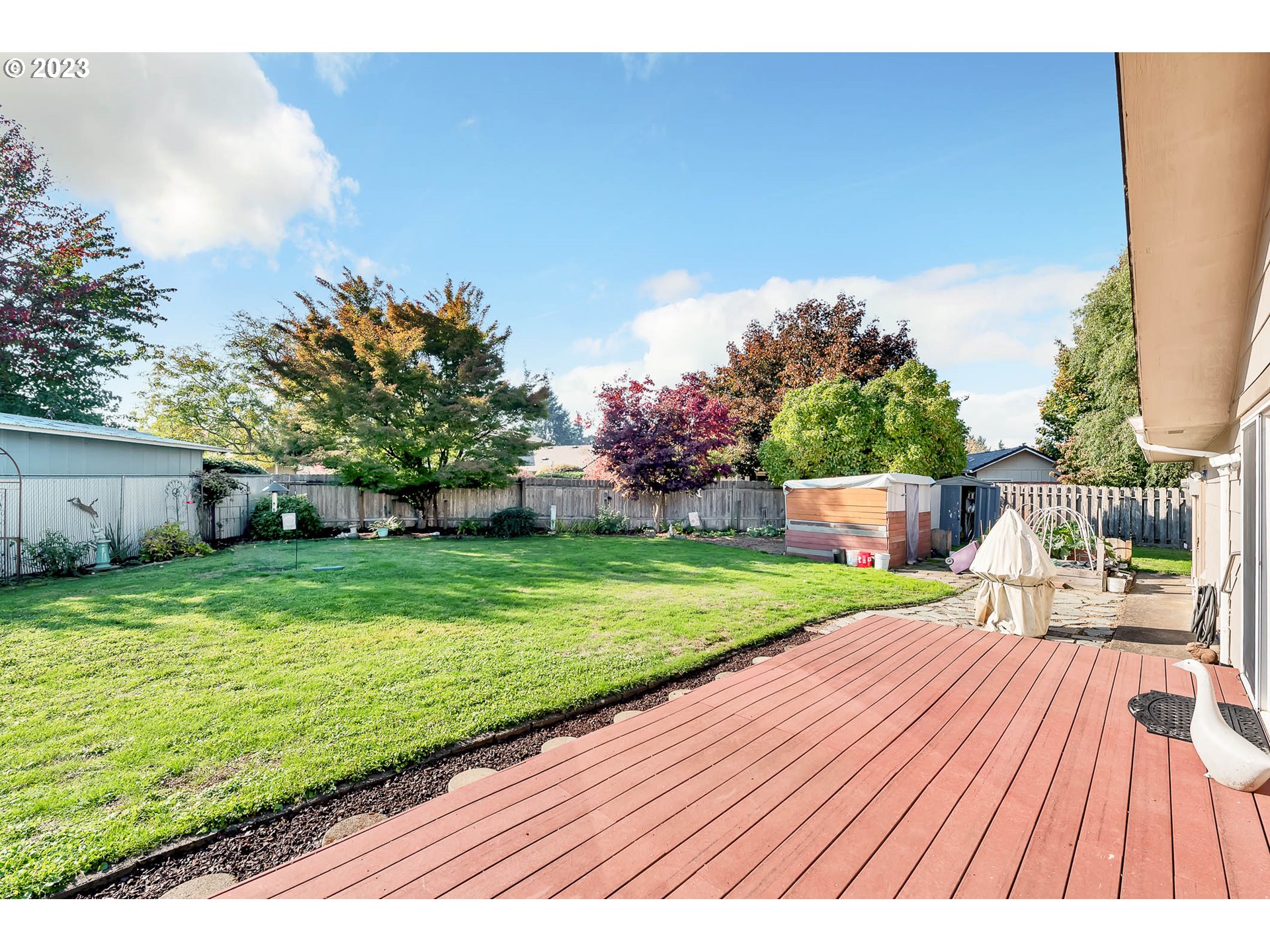 576 67th Street Springfield, OR 97478 - Photo 25 of 32 a view of a backyard with wooden floor