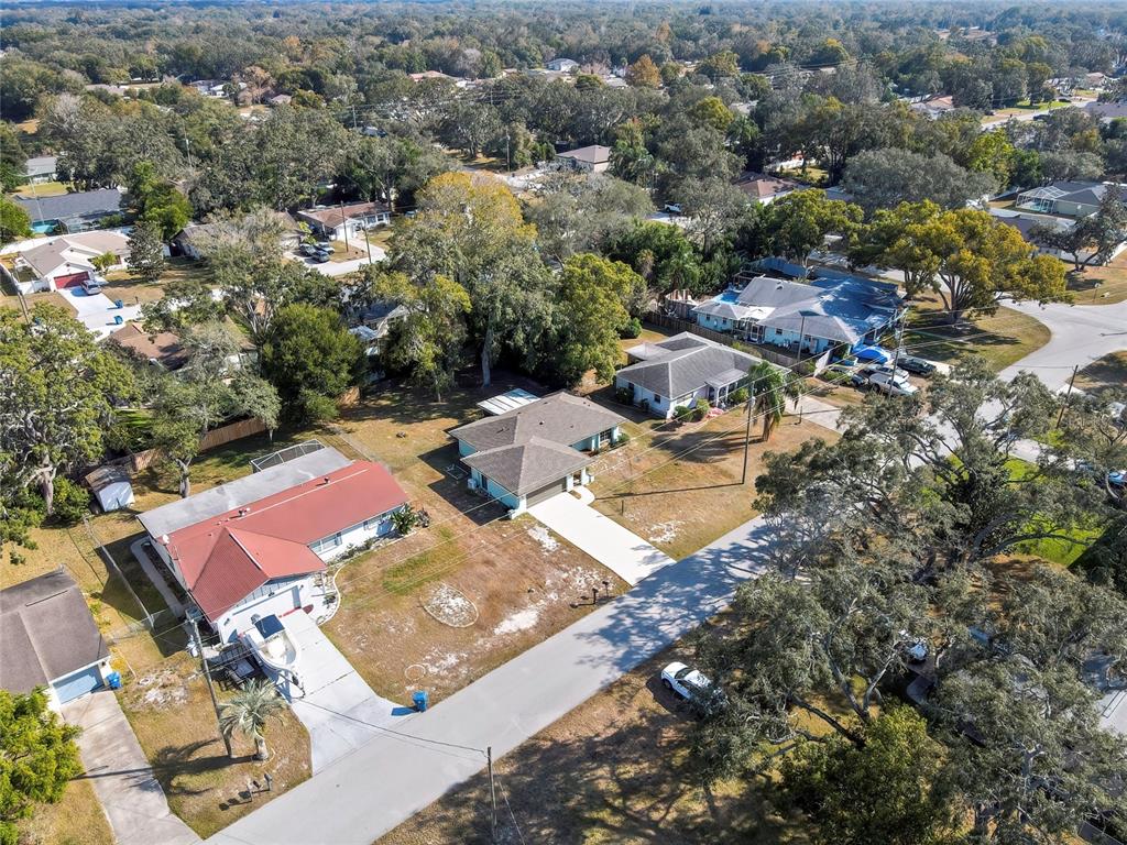 368 Portland Avenue Spring Hill, FL 34606 - Photo 13 of 38 an aerial view of residential houses with outdoor space