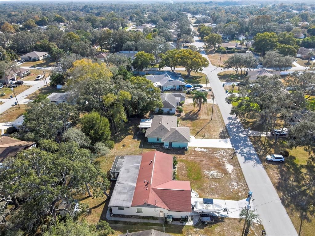 368 Portland Avenue Spring Hill, FL 34606 - Photo 14 of 38 an aerial view of residential houses with outdoor space