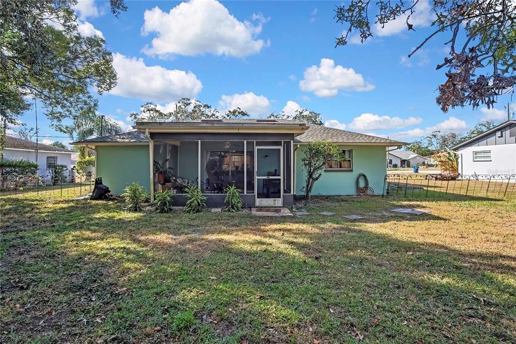 368 Portland Avenue Spring Hill, FL 34606 - Photo 17 of 38 a view of a house with backyard and sitting area