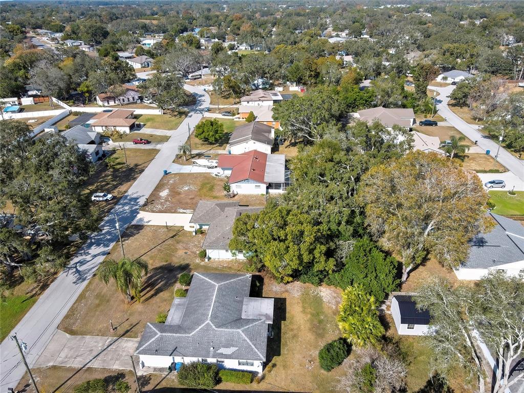 368 Portland Avenue Spring Hill, FL 34606 - Photo 2 of 38 an aerial view of residential houses with outdoor space