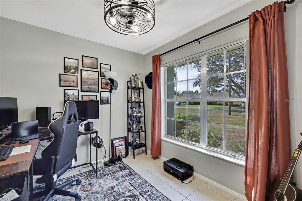 368 Portland Avenue Spring Hill, FL 34606 - Photo 28 of 38 a view of a livingroom with furniture and a window