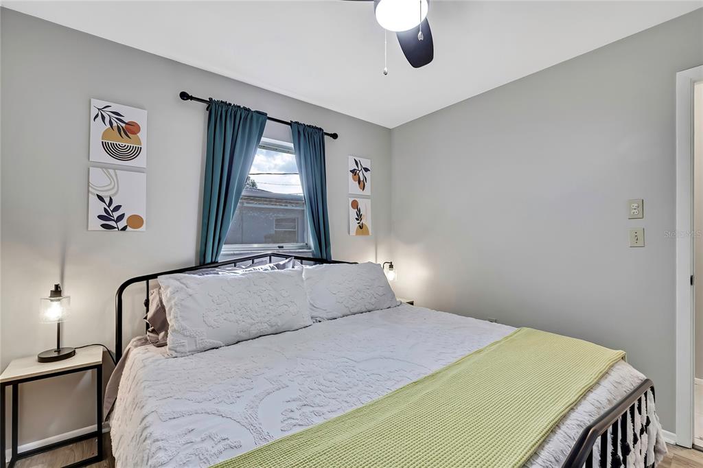 368 Portland Avenue Spring Hill, FL 34606 - Photo 30 of 38 a bedroom with a bed and a window