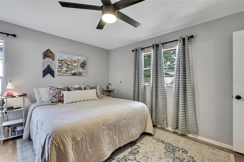 368 Portland Avenue Spring Hill, FL 34606 - Photo 33 of 38 a bedroom with a large bed and a window