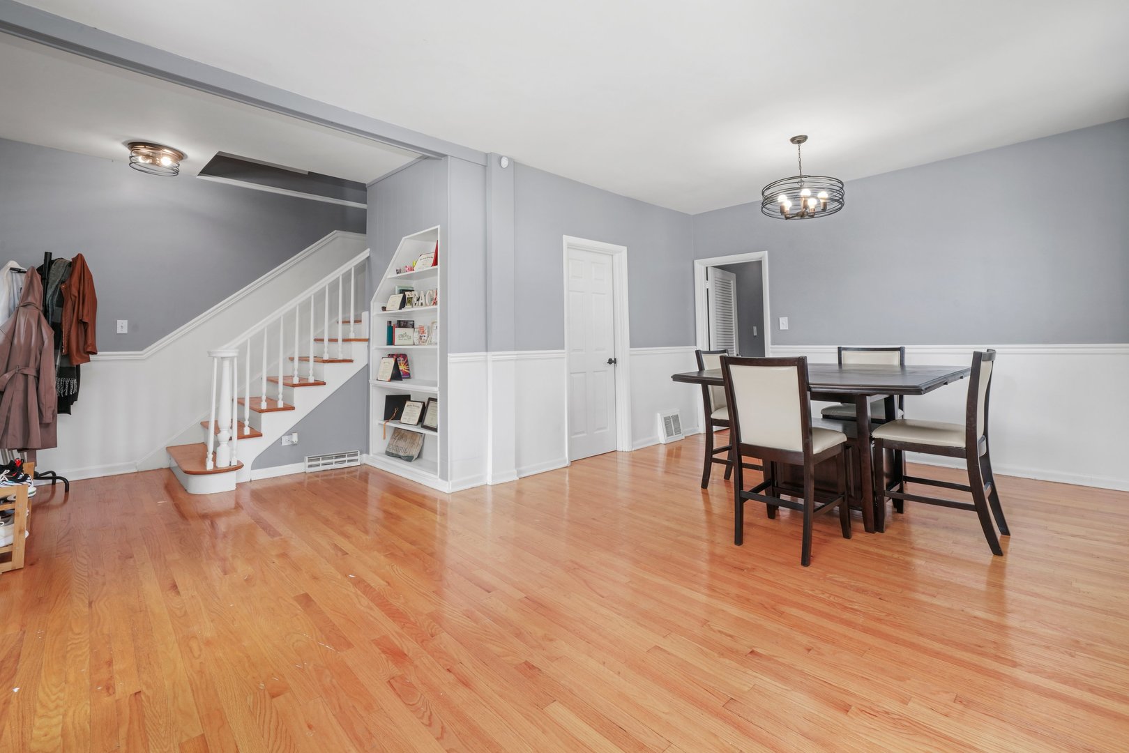 5648 Hawthorne Avenue Berkeley, IL 60163 - Photo 7 of 25 a view of a dining room with furniture and wooden floor