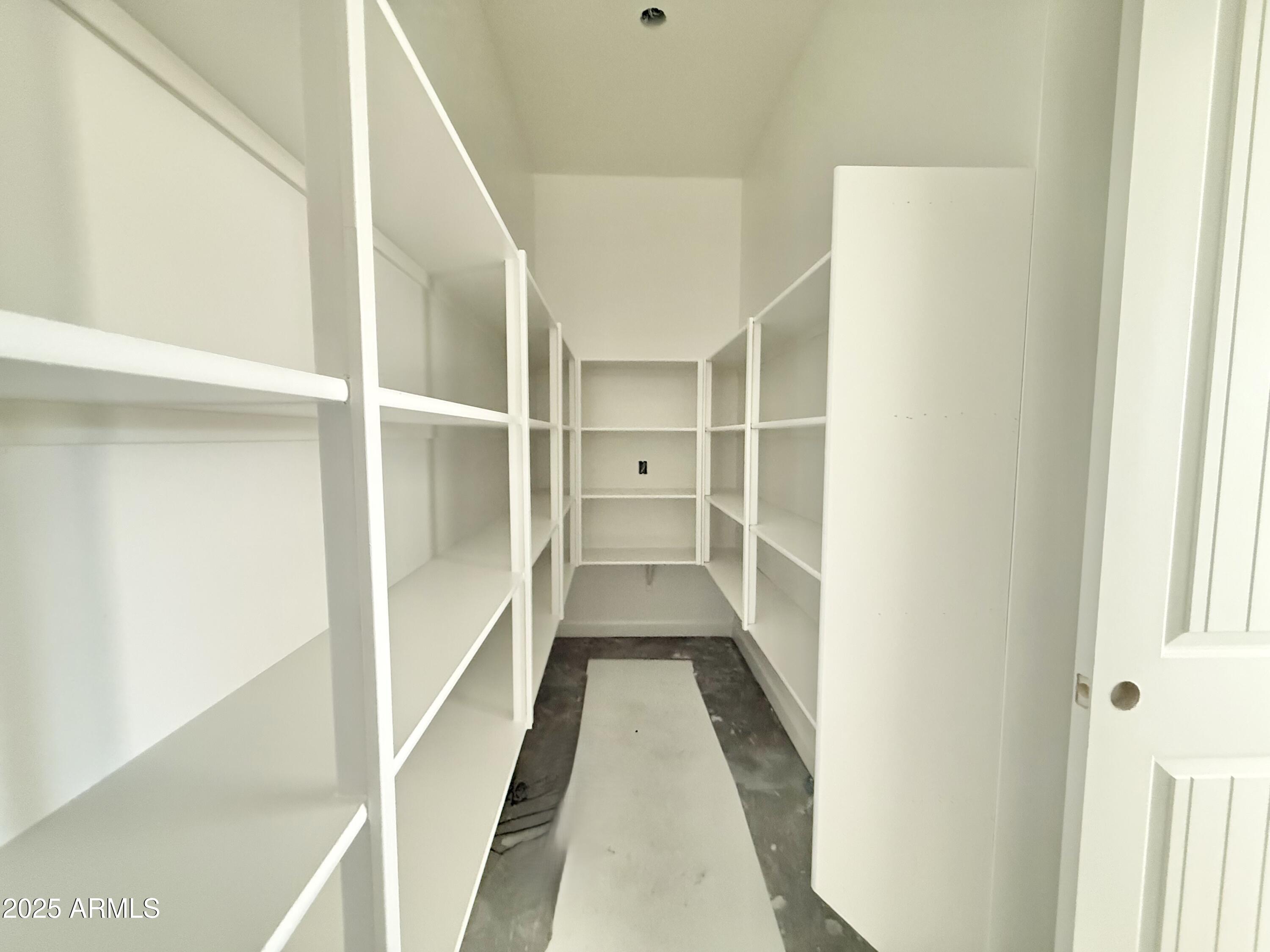 22757 East Saddle Way Queen Creek, AZ 85142 - Photo 16 of 34 a view of gallery with wooden floor