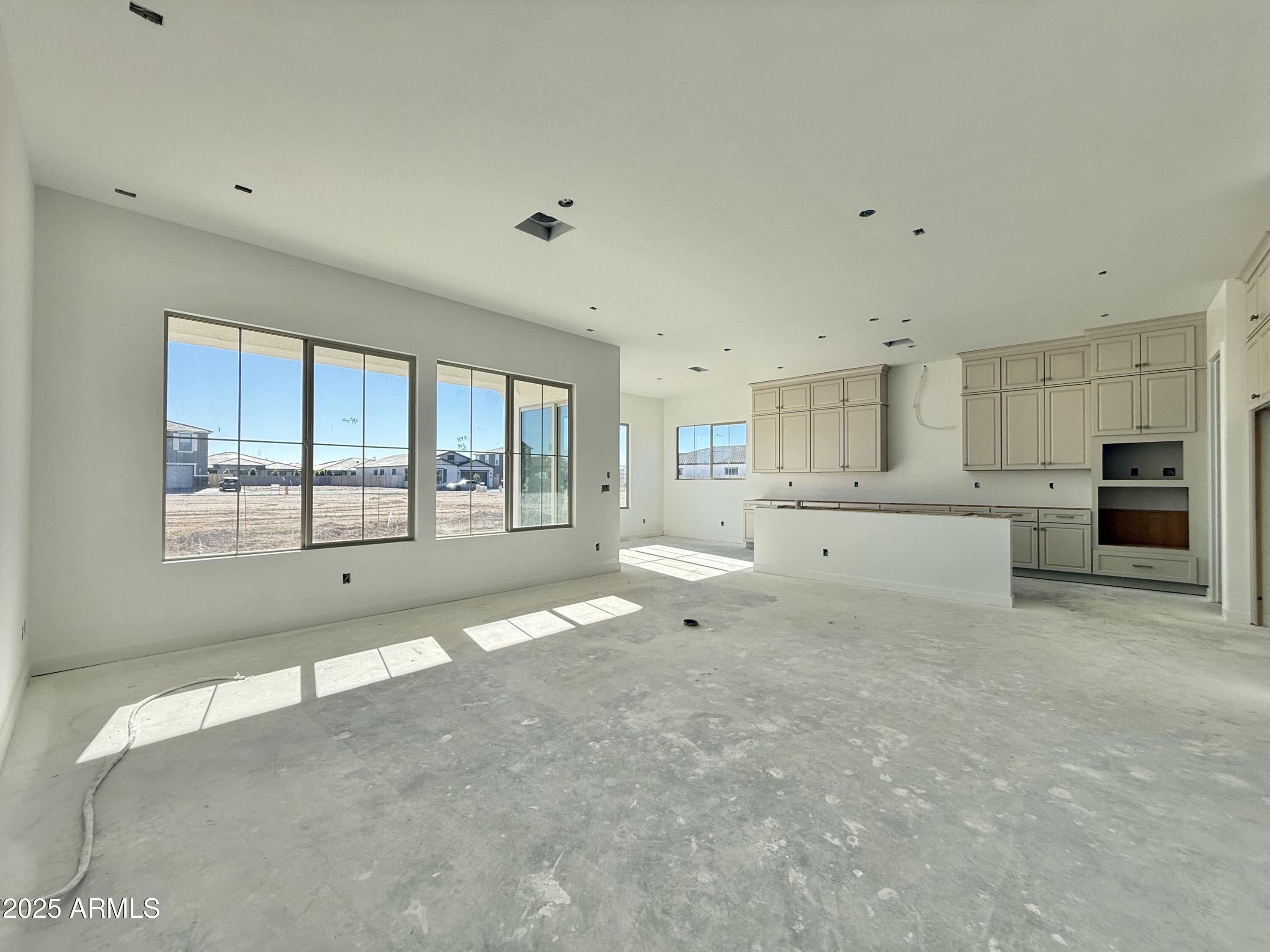 22757 East Saddle Way Queen Creek, AZ 85142 - Photo 19 of 34 a view of an empty room with a window