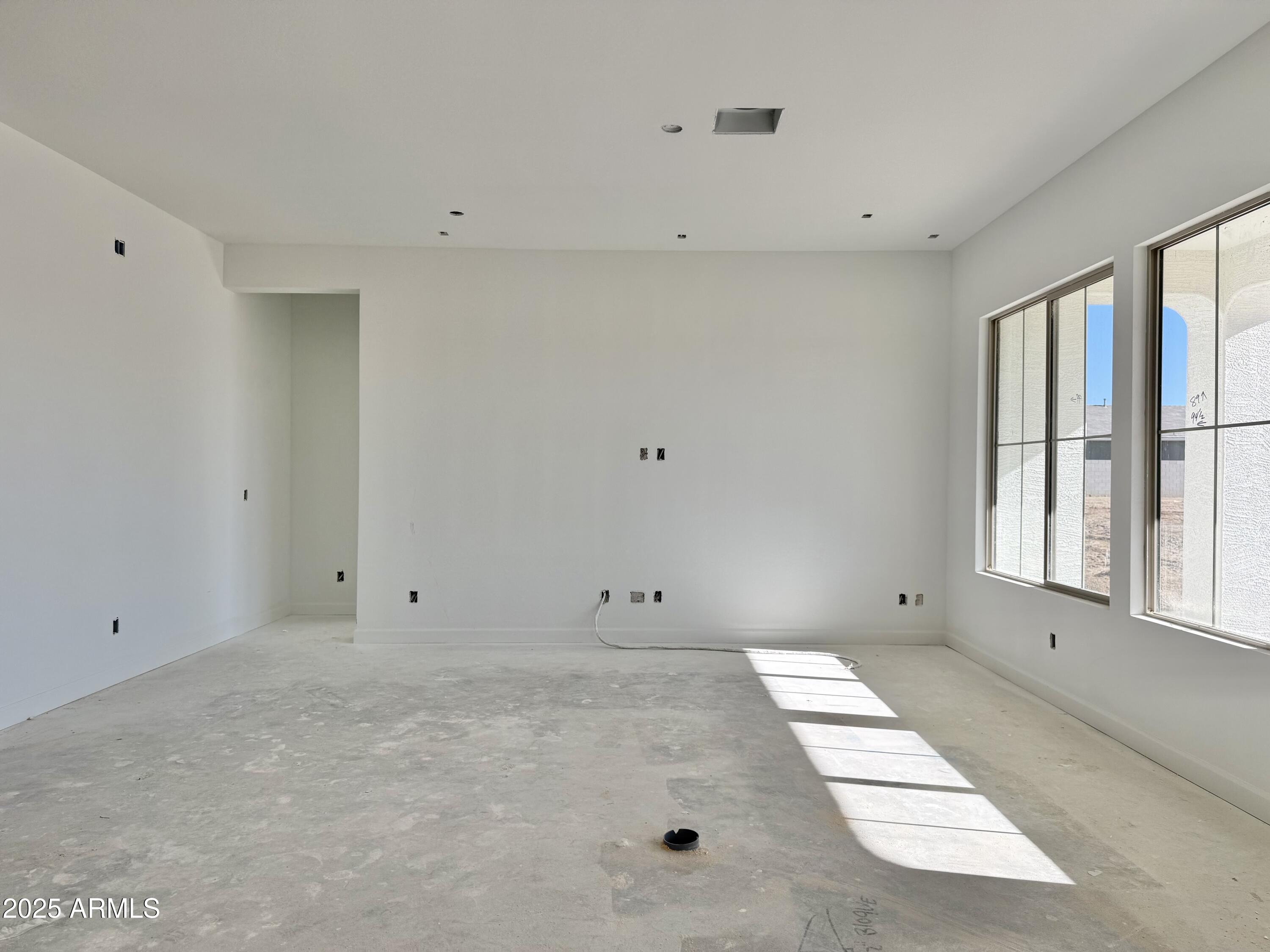 22757 East Saddle Way Queen Creek, AZ 85142 - Photo 20 of 34 a view of an empty room with a window