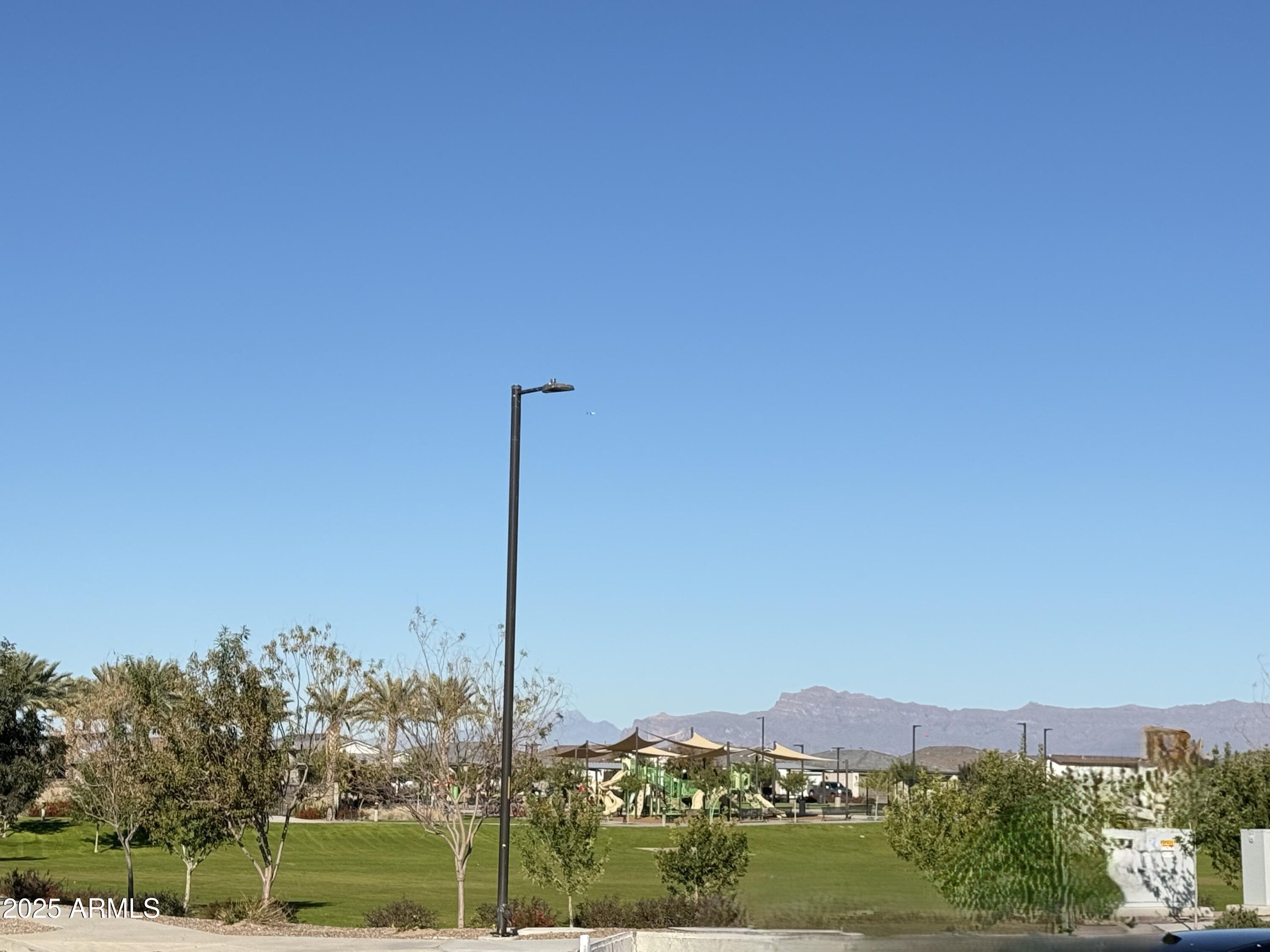 22757 East Saddle Way Queen Creek, AZ 85142 - Photo 2 of 34 a view of a city with a building in the background