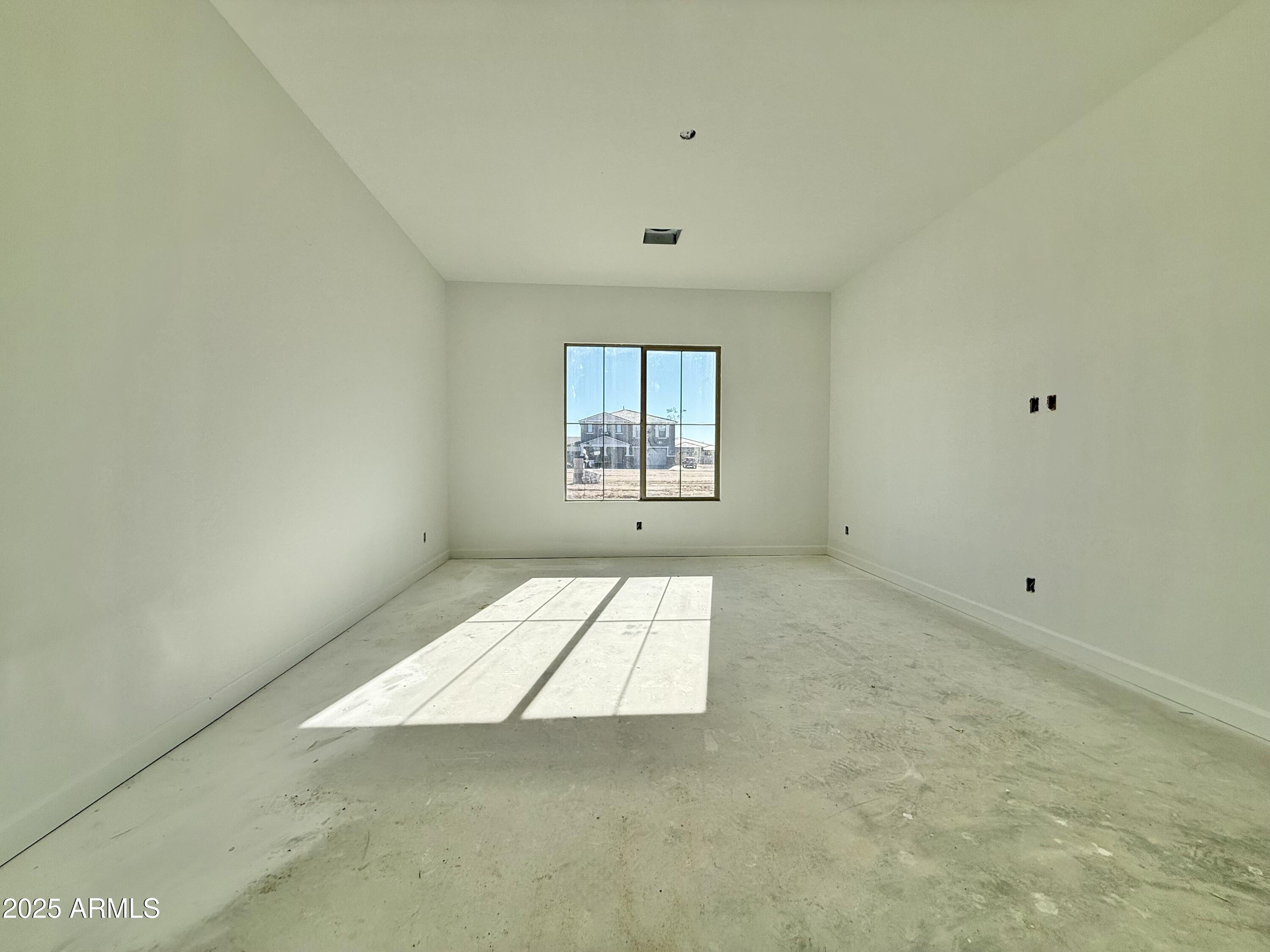 22757 East Saddle Way Queen Creek, AZ 85142 - Photo 21 of 34 an empty room with windows