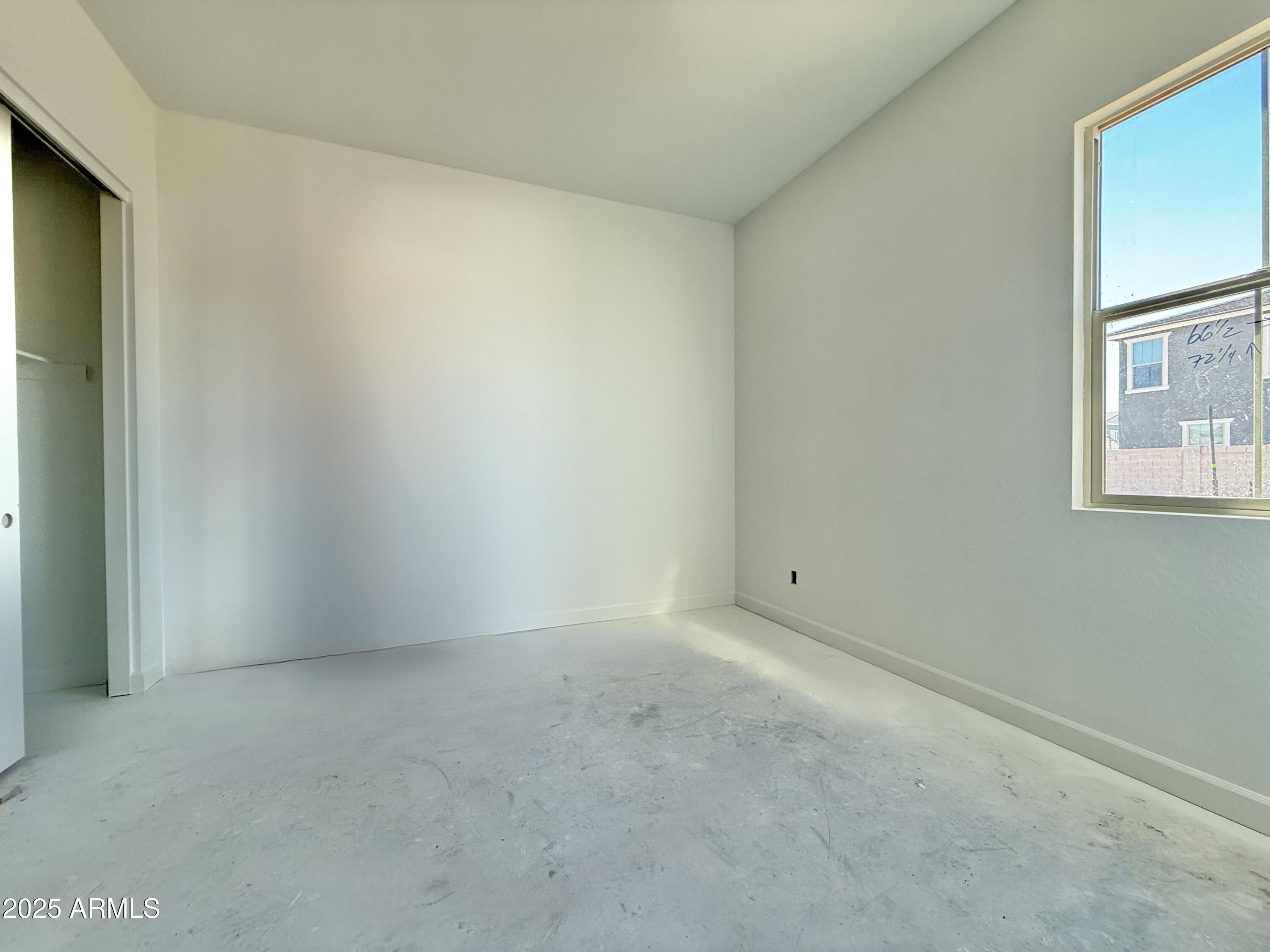 22757 East Saddle Way Queen Creek, AZ 85142 - Photo 6 of 34 a view of an empty room
