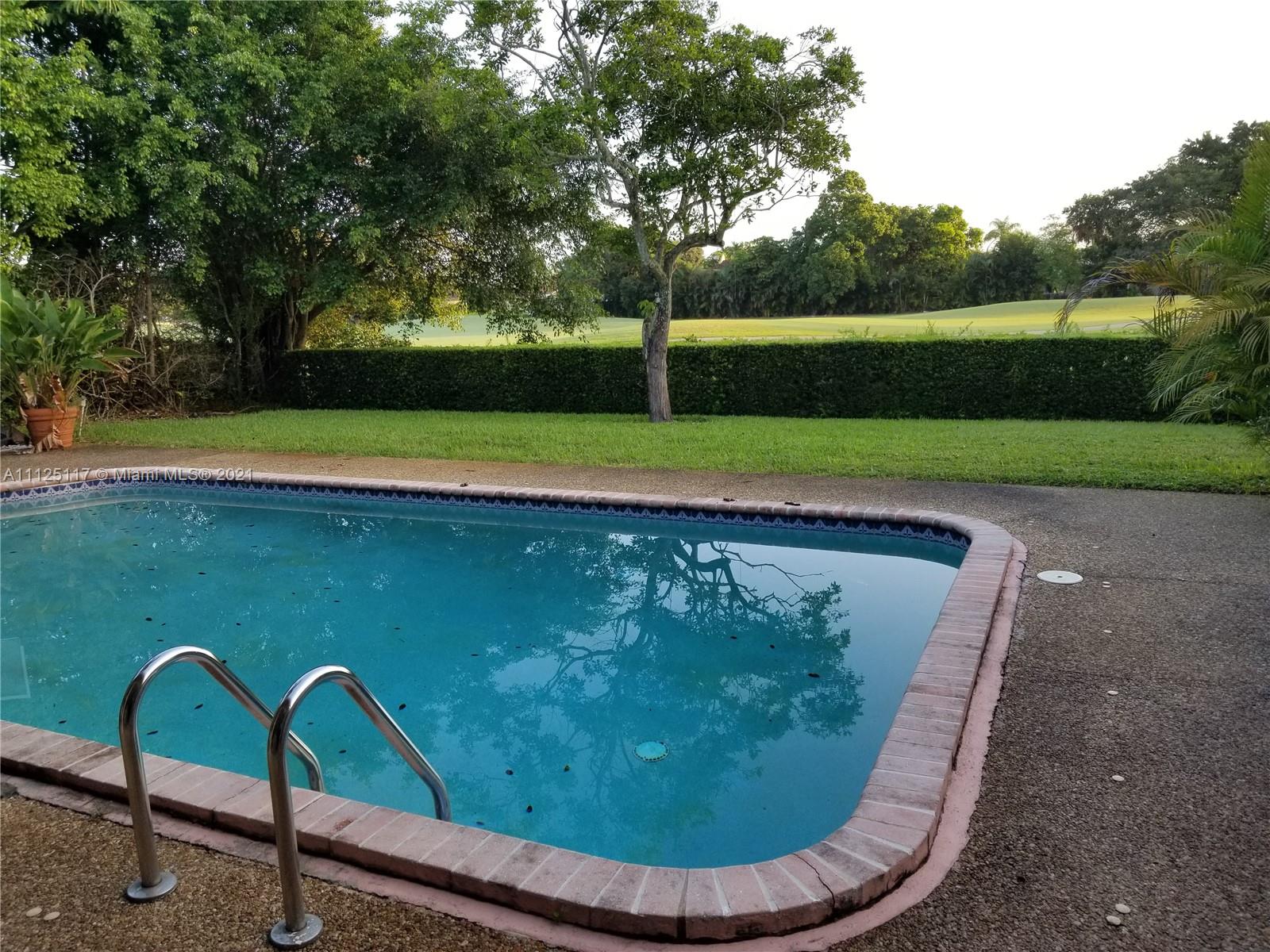 Emerald Hills Hollywood, FL 33021 - Photo 3 of 4 a view of a garden with large trees