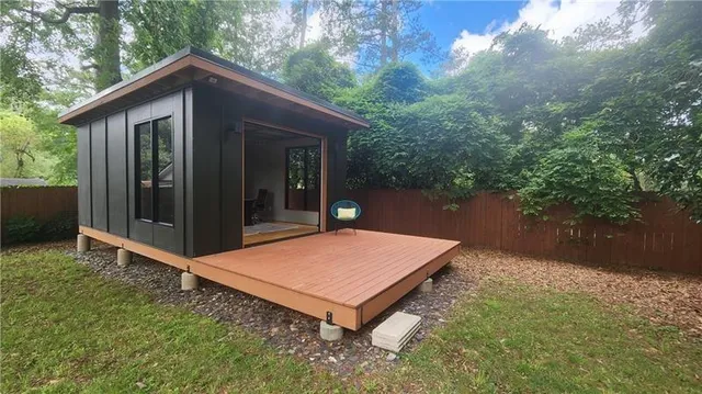 a backyard of a house with lots of green space