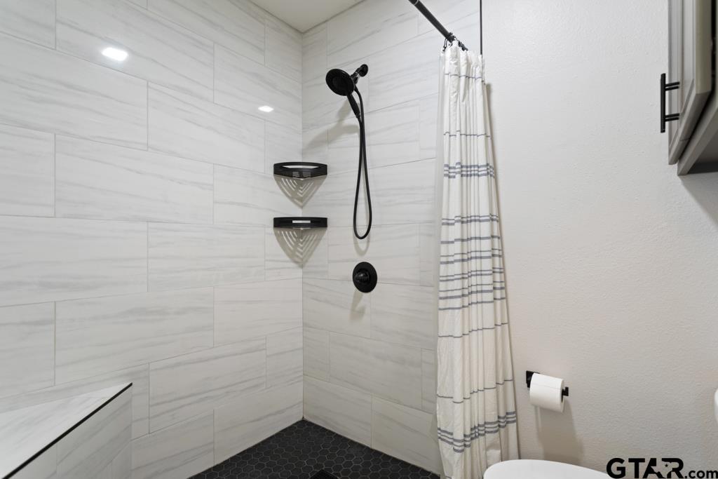 600 Frederick Circle Flint, TX 75762 - Photo 17 of 32 a bathroom with a shower