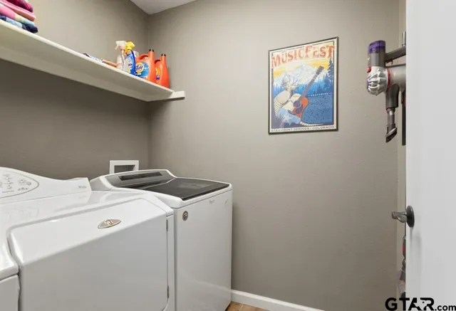 a utility room with dryer and washer