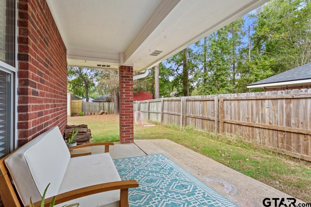 600 Frederick Circle Flint, TX 75762 - Photo 28 of 32 a view of a backyard with a garden and deck
