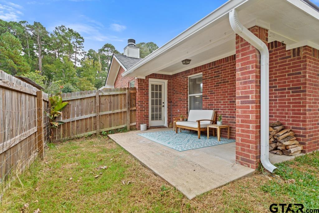 600 Frederick Circle Flint, TX 75762 - Photo 30 of 32 a backyard of a house with seating space