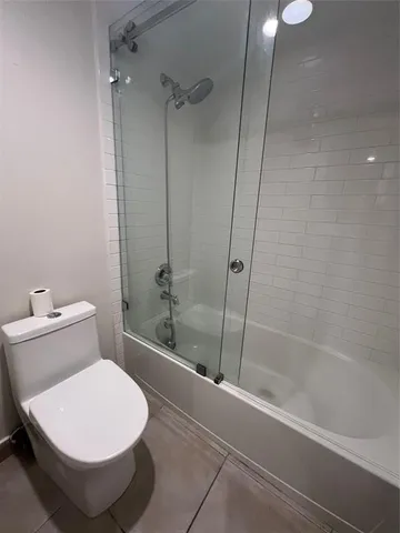 a view of a brick building with a large window