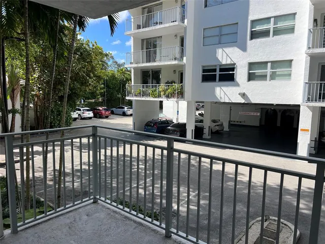 a view of swimming pool with outdoor seating