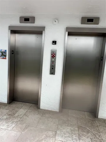 a view of balcony with plants and outdoor seating