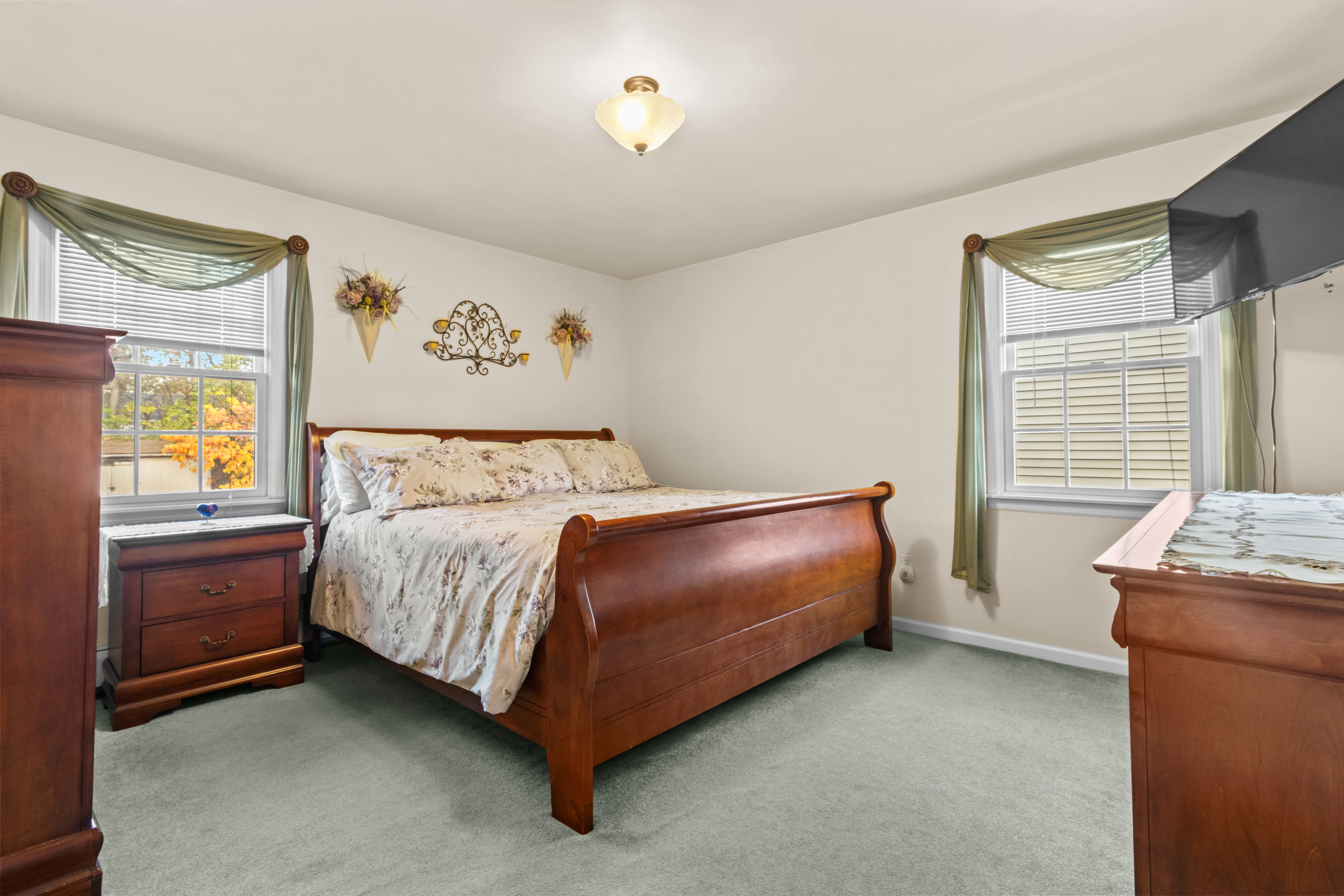 16 Katy Lane Norwalk, CT 06851 - Photo 12 of 31 a bedroom with a bed and a window