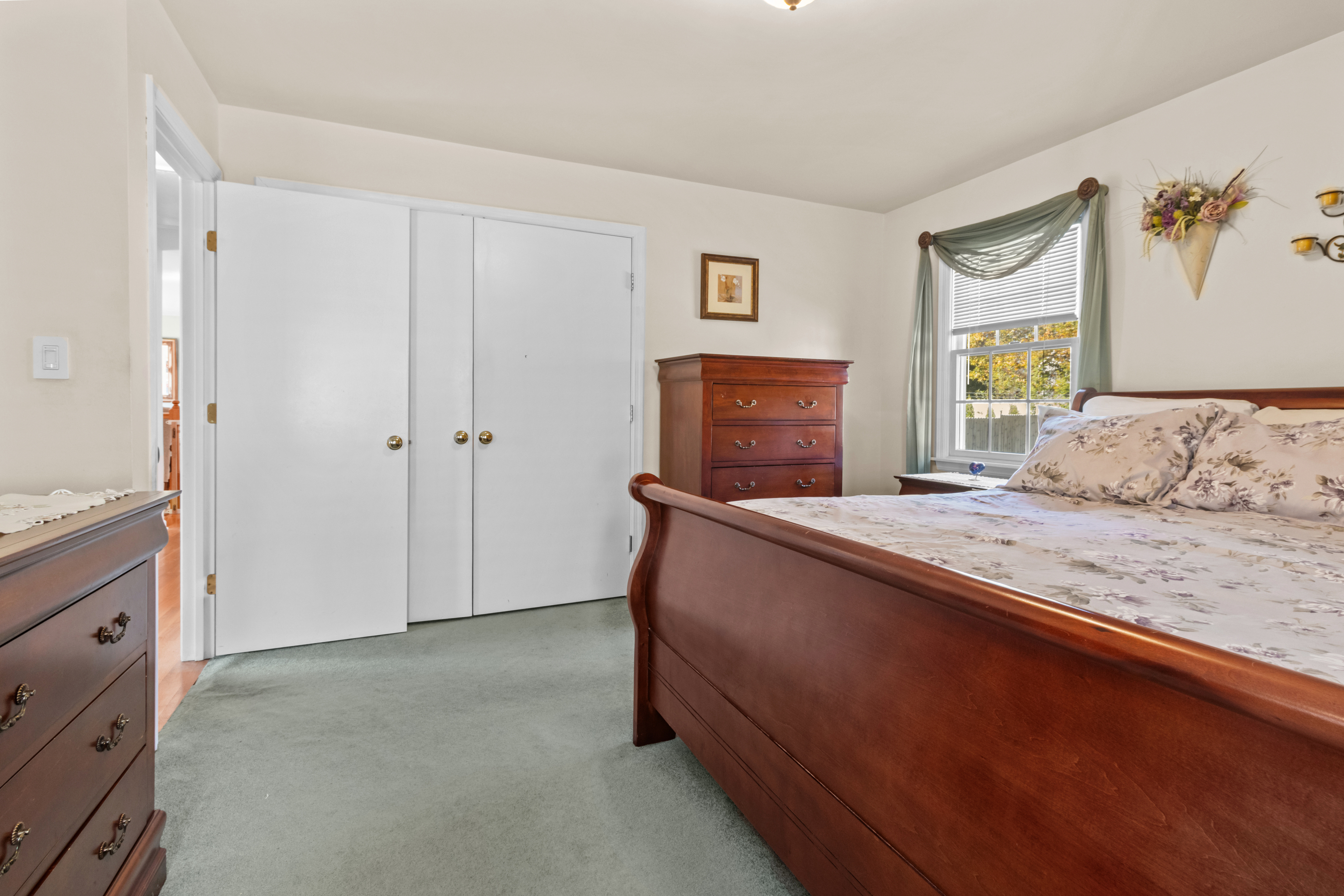 16 Katy Lane Norwalk, CT 06851 - Photo 13 of 31 a bedroom with a bed and a window