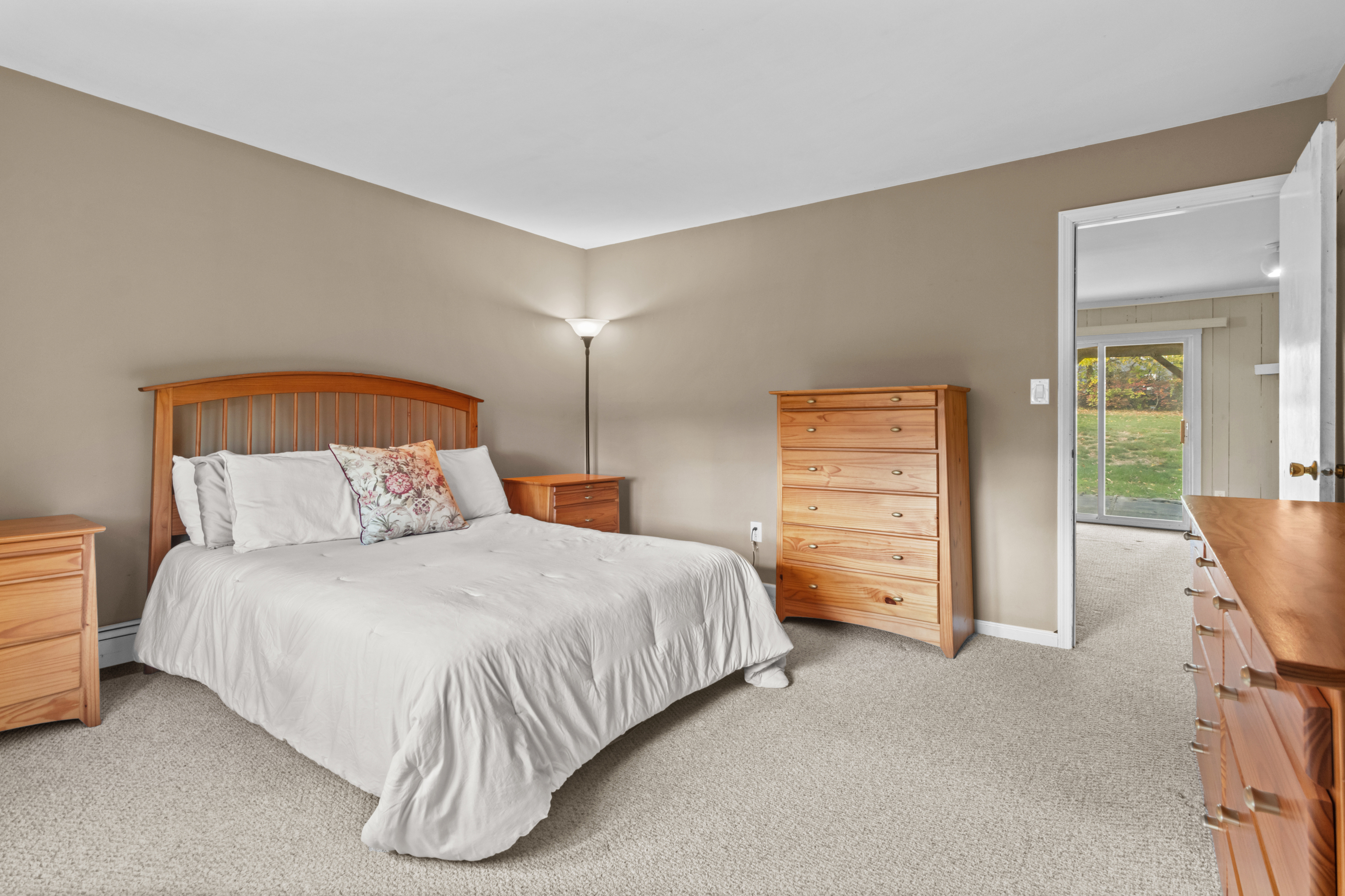 16 Katy Lane Norwalk, CT 06851 - Photo 19 of 31 a bedroom with a bed and a cabinets