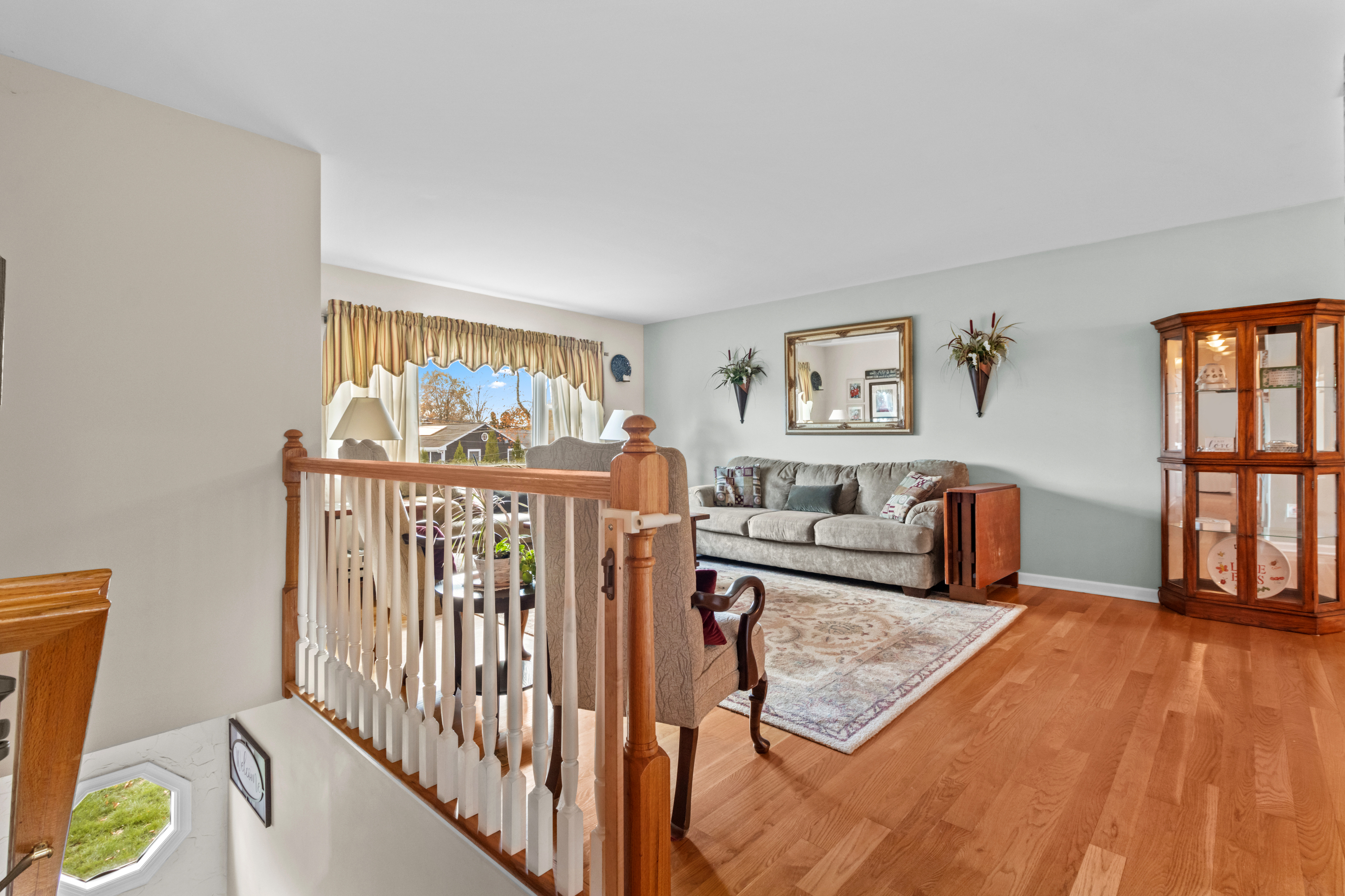 16 Katy Lane Norwalk, CT 06851 - Photo 2 of 31 a living room with furniture and a large window