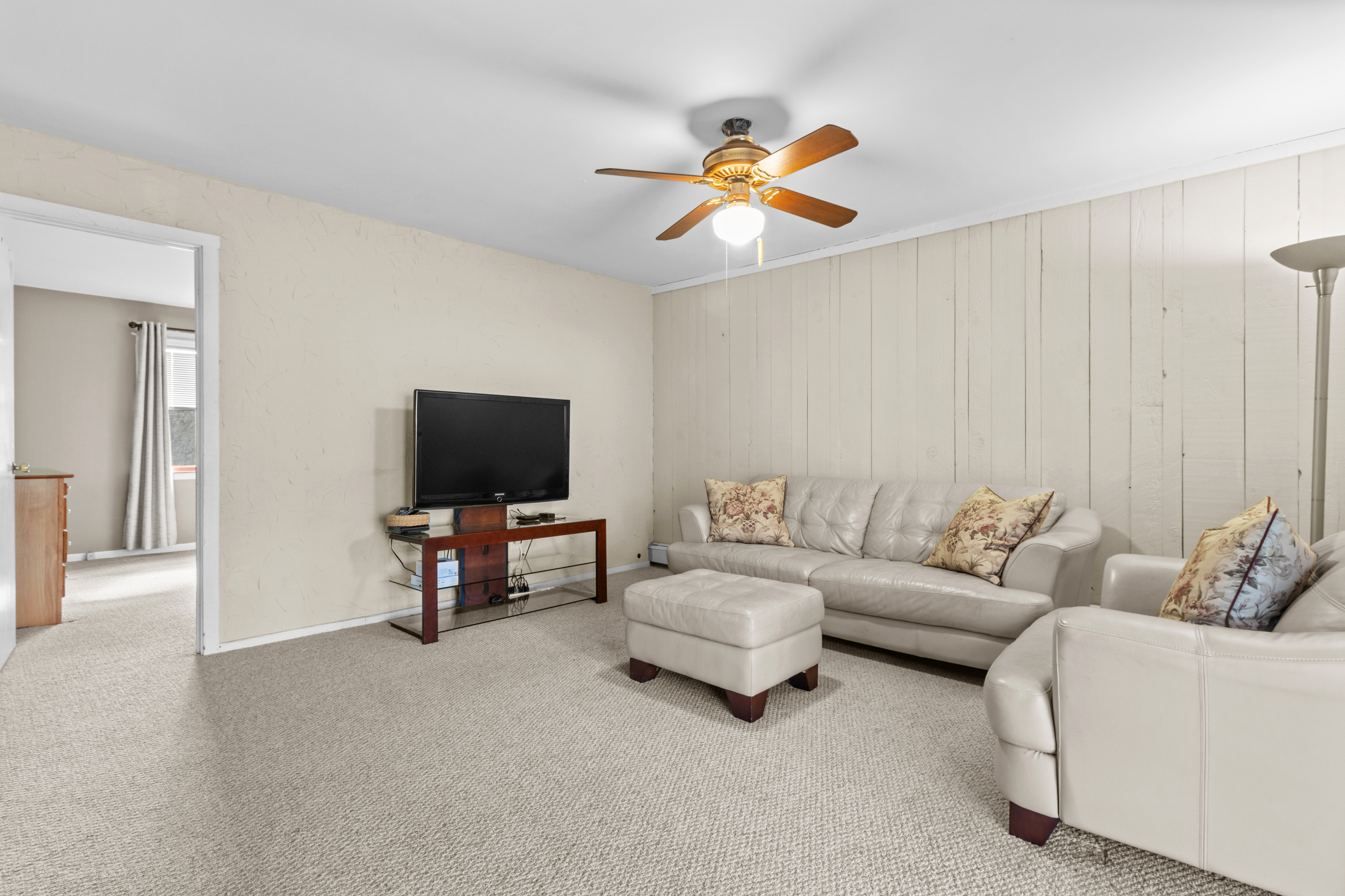 16 Katy Lane Norwalk, CT 06851 - Photo 22 of 31 a living room with furniture and a flat screen tv