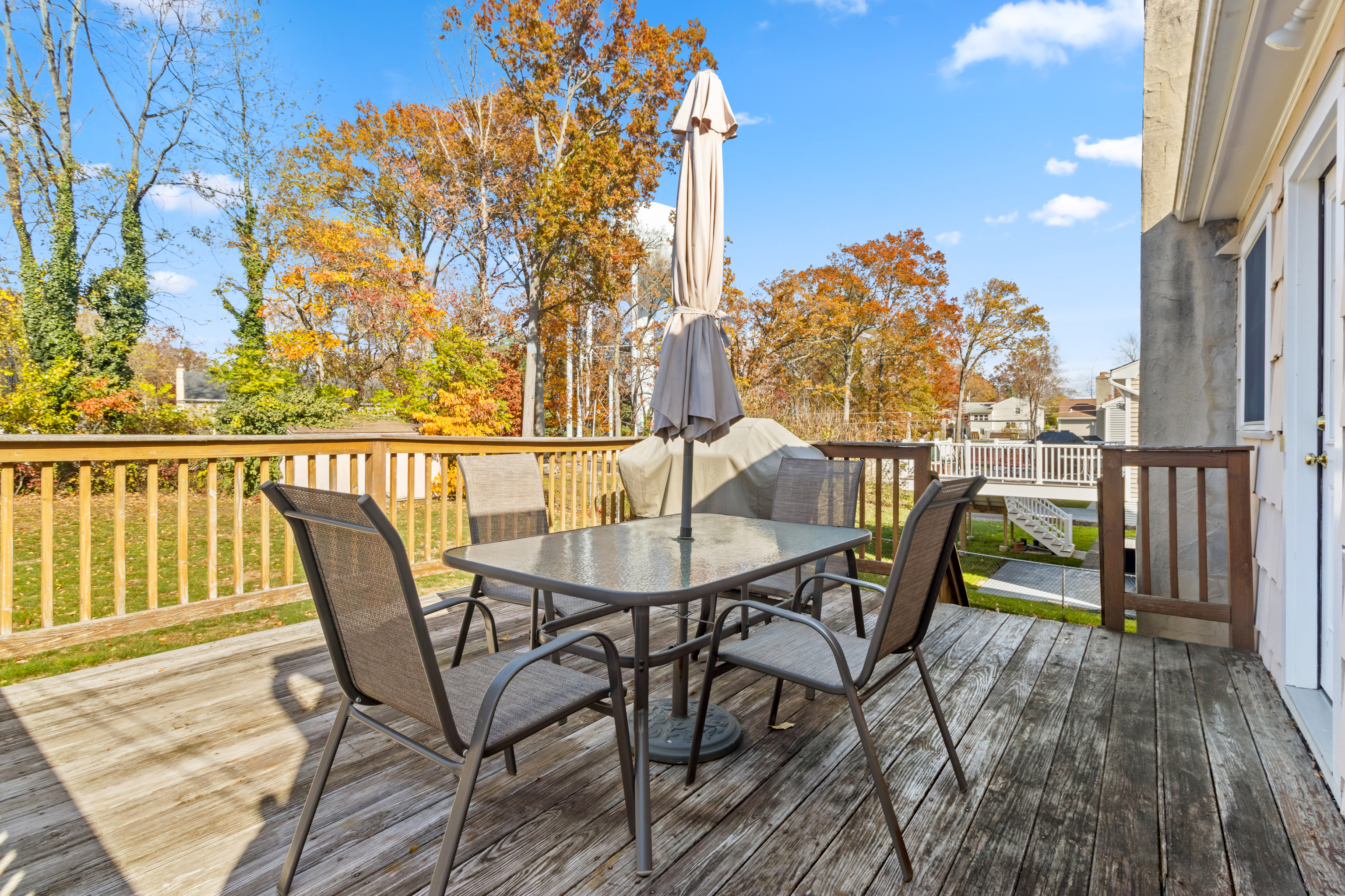 16 Katy Lane Norwalk, CT 06851 - Photo 25 of 31 a view of a chairs and table on the wooden floor