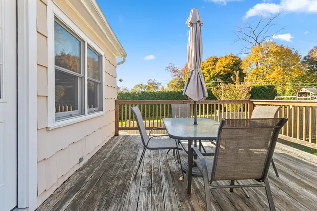 a view of a chairs on the roof deck