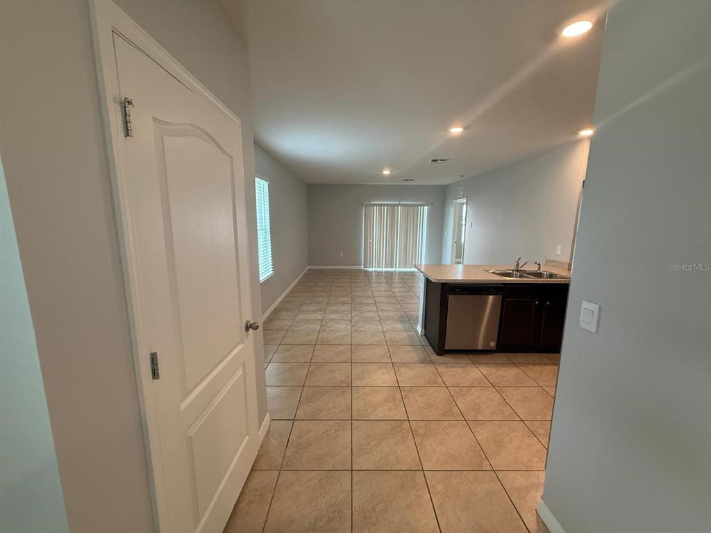754 Chinoy Road Davenport, FL 33837 - Photo 10 of 26 a view of a kitchen with a sink and a dishwasher