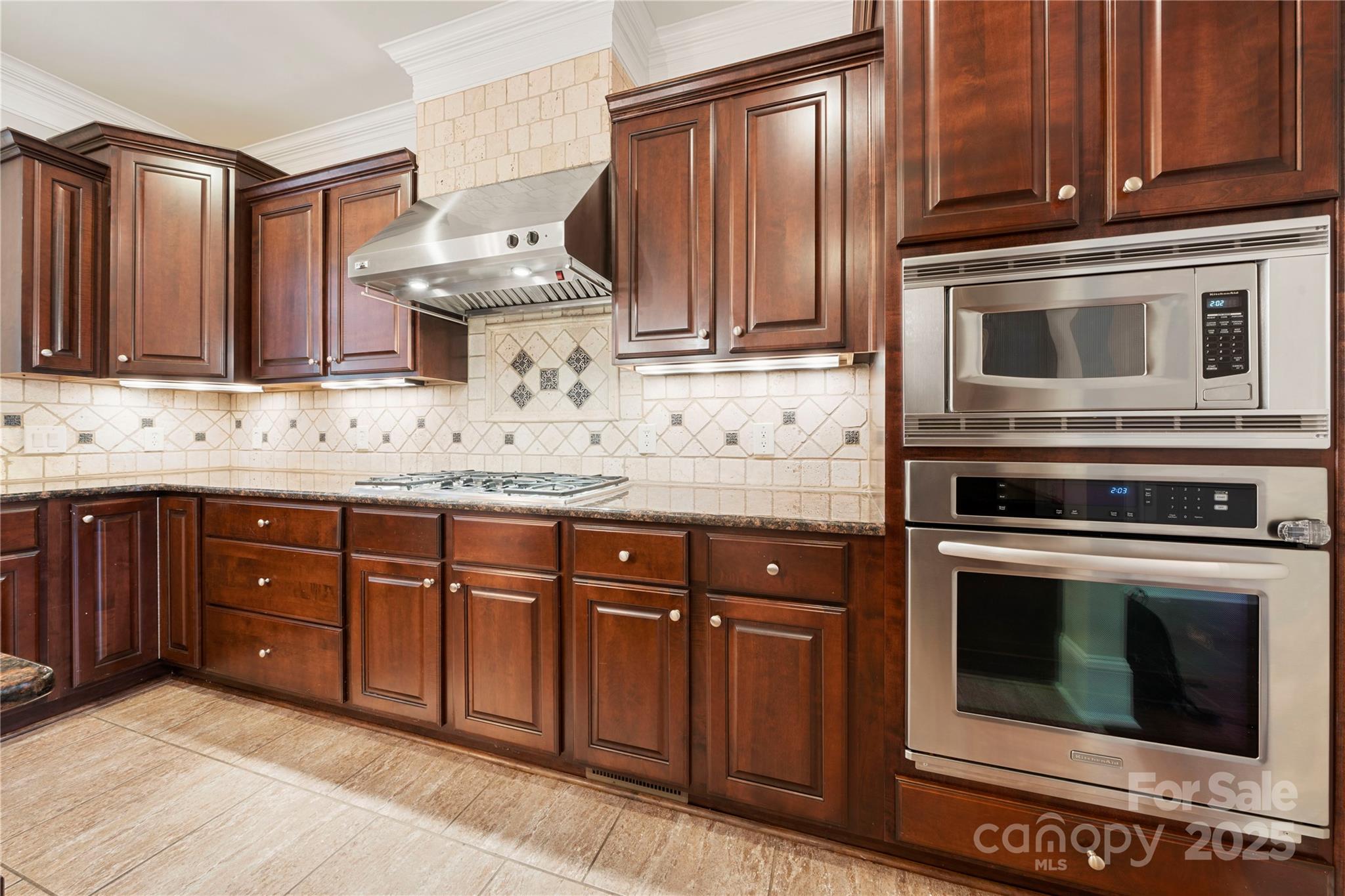310 Ridge Reserve Drive Clover, SC 29710 - Photo 11 of 39 a kitchen with granite countertop cabinets stainless steel appliances and a sink