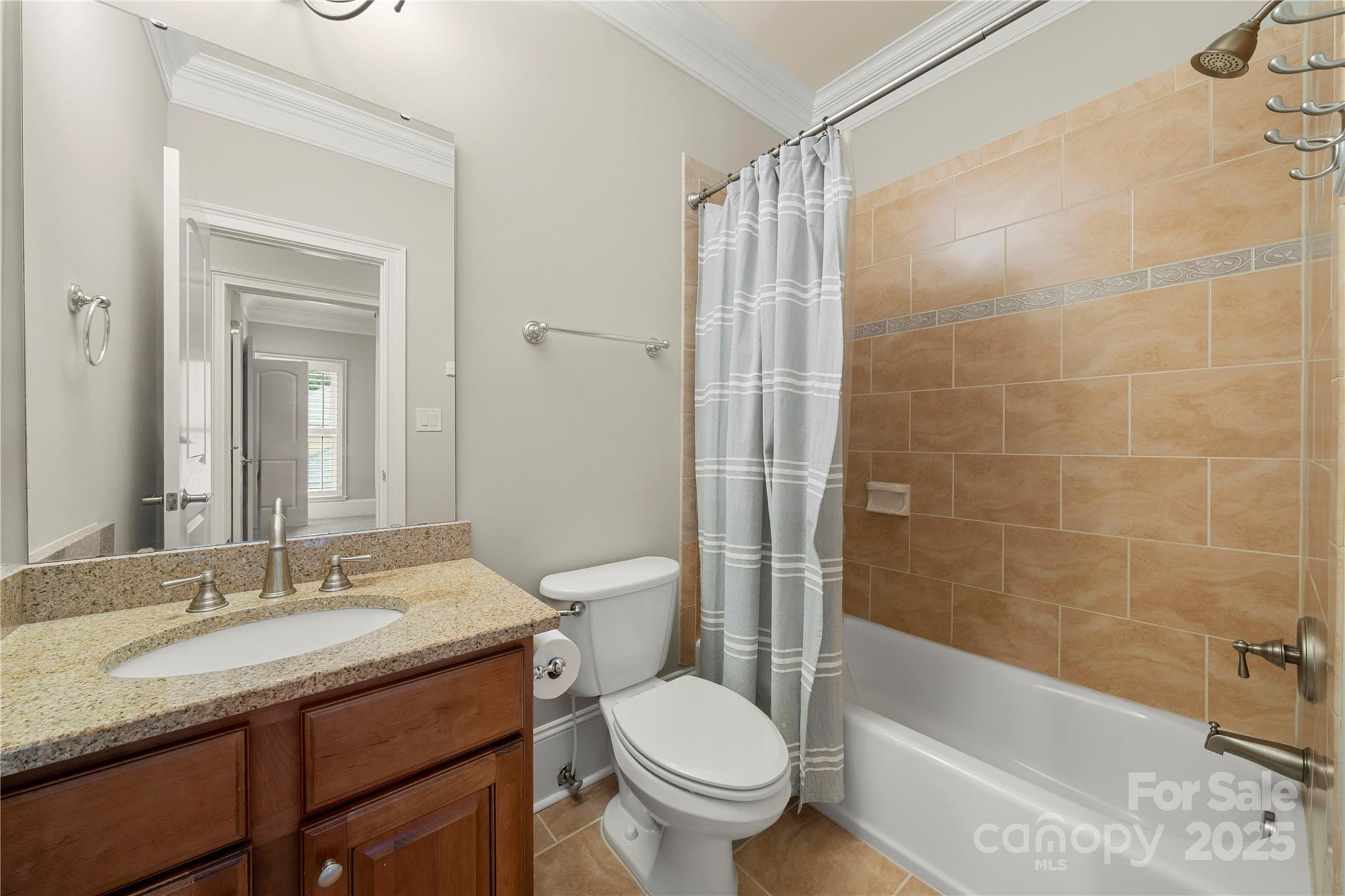 310 Ridge Reserve Drive Clover, SC 29710 - Photo 20 of 39 a bathroom with a granite countertop sink toilet and shower
