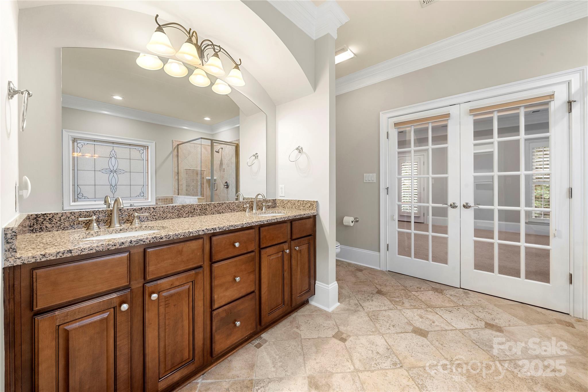 310 Ridge Reserve Drive Clover, SC 29710 - Photo 30 of 39 a spacious bathroom with a granite countertop double vanity sink a mirror and a bathtub