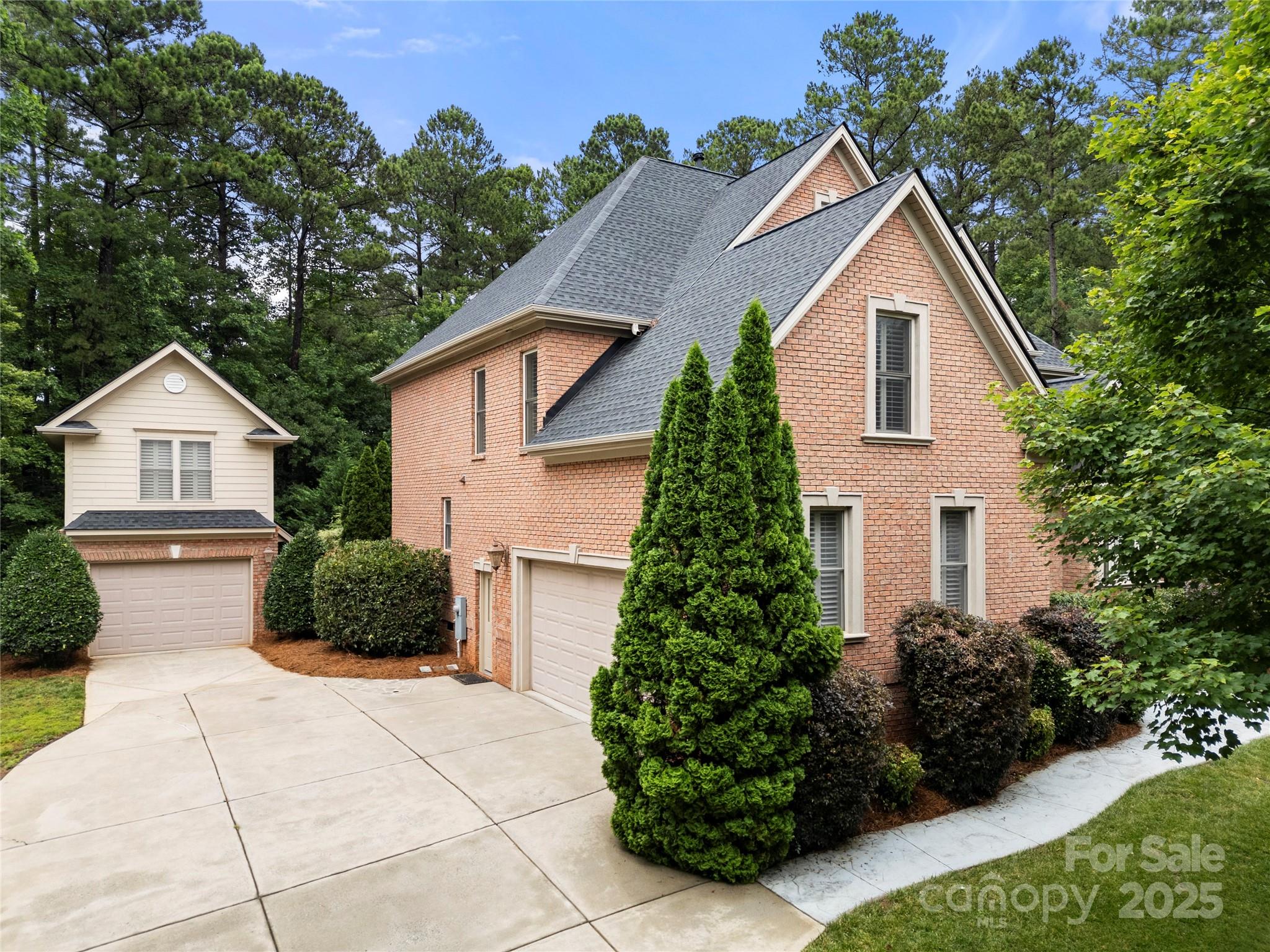 310 Ridge Reserve Drive Clover, SC 29710 - Photo 4 of 39 a front view of a house with garden
