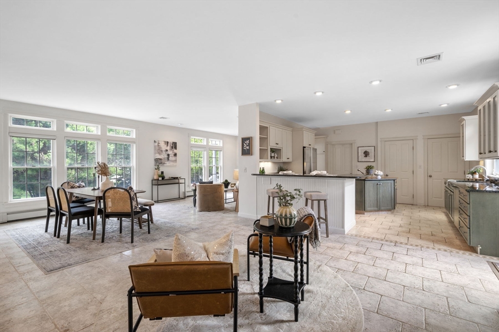 a living room with furniture and a table